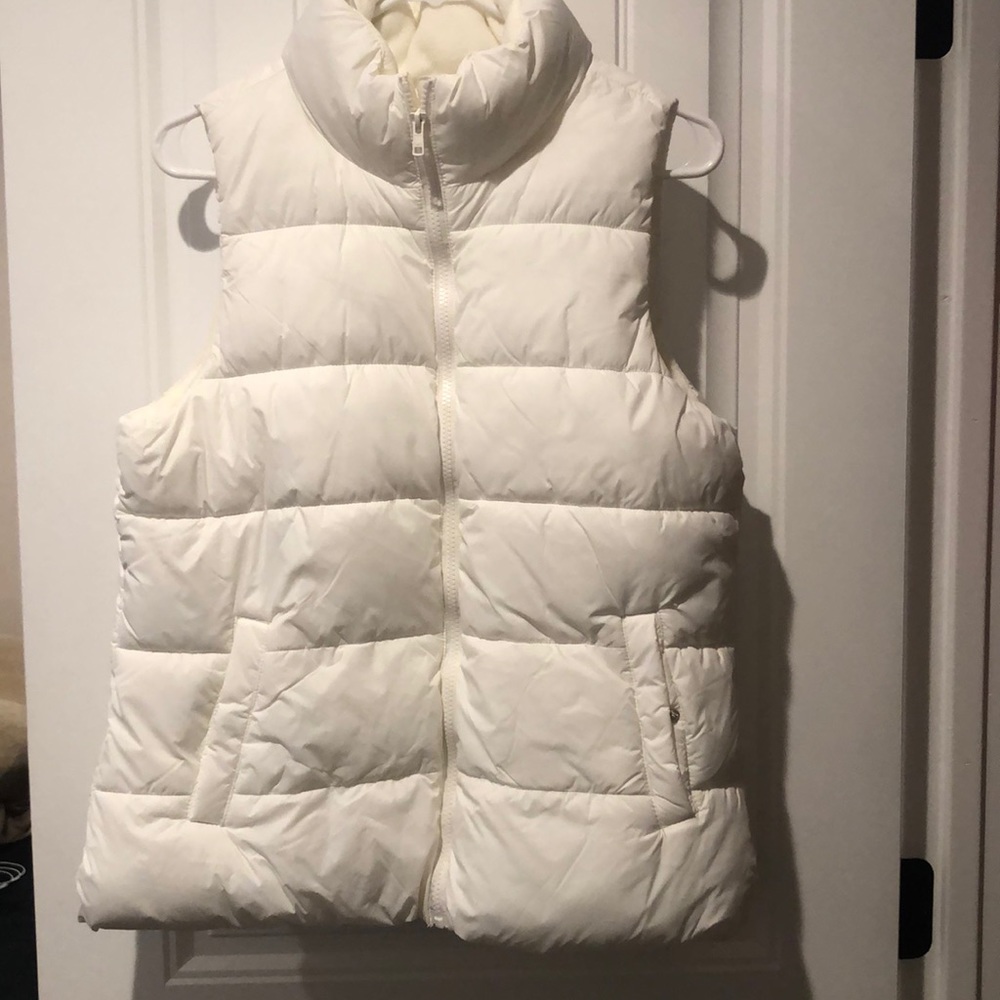 white puffy vest